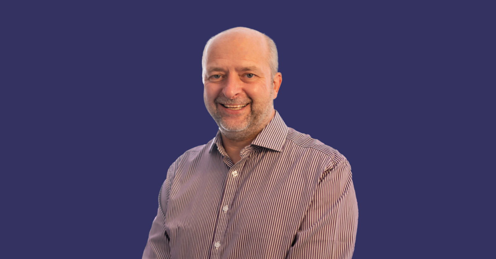 photo of Mark Solomons, Founder and CEO of Welbee on a dark blue background