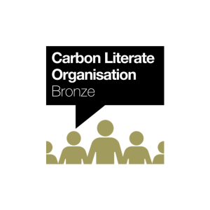 Five bronze silhouettes beneath a black speech bubble with "Carbon Literate Organisation Bronze" written inside