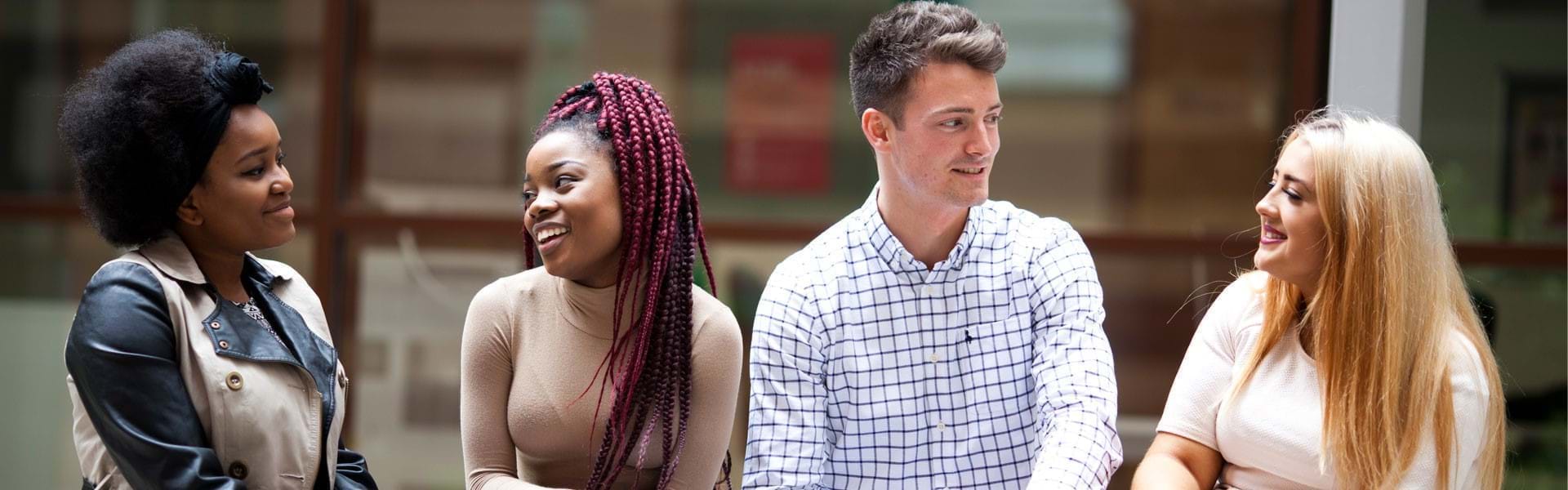 Image of a group colleagues in conversation