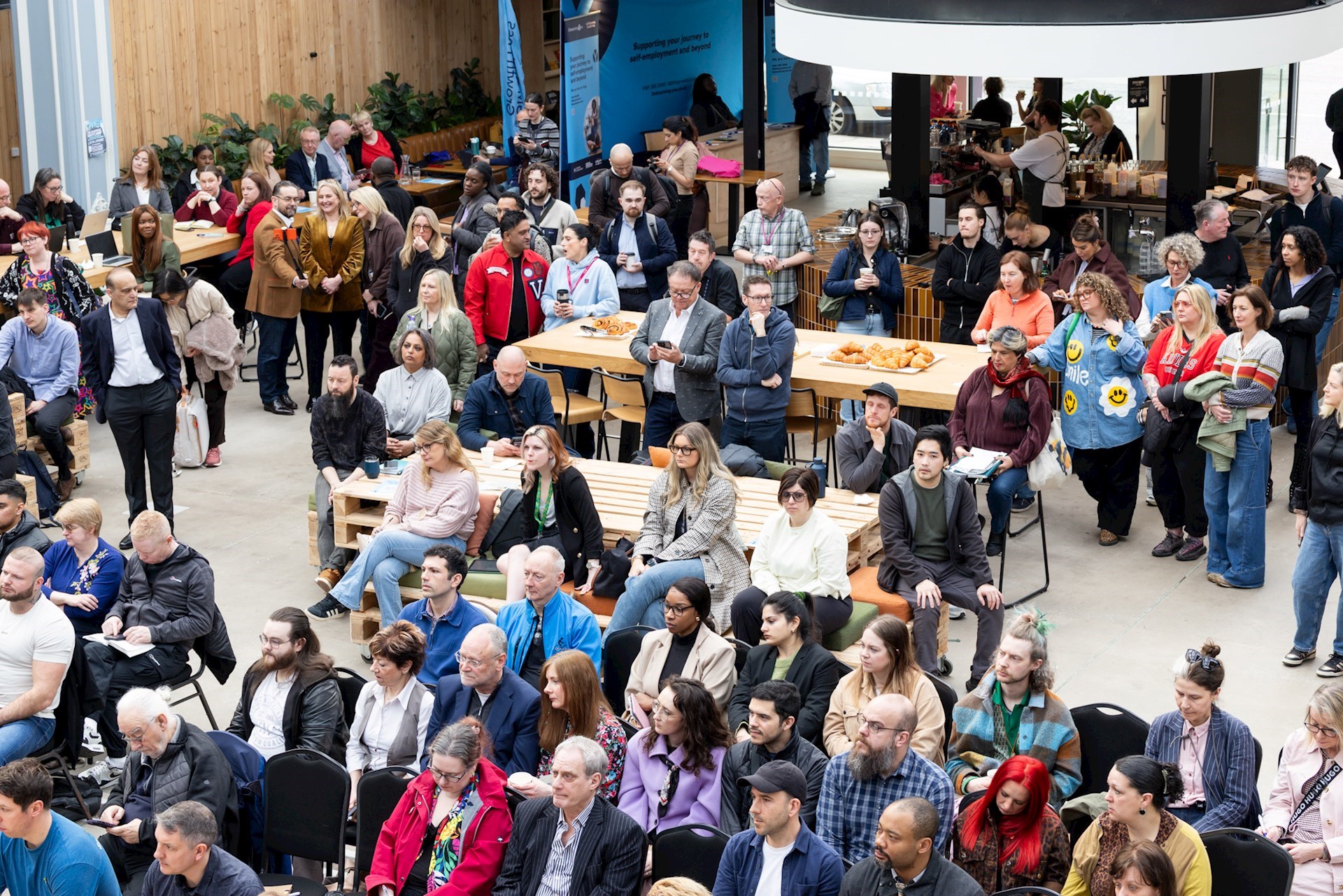 Large crowd of event attendees at one of our business support events