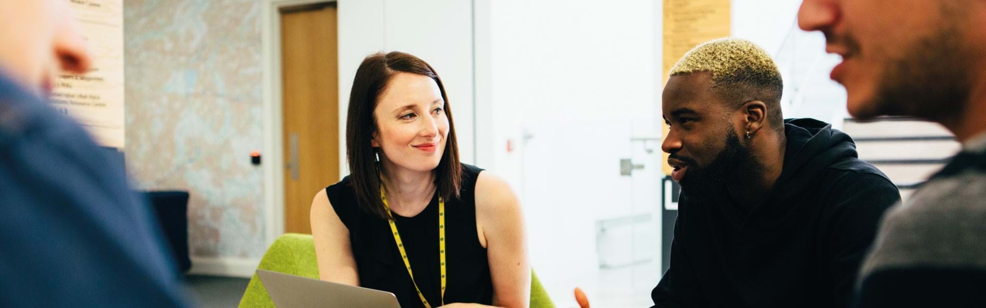 Image of 4 Growth Company colleagues in conversation